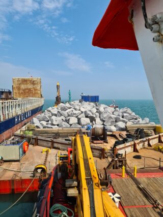 Transfer of rock to barge