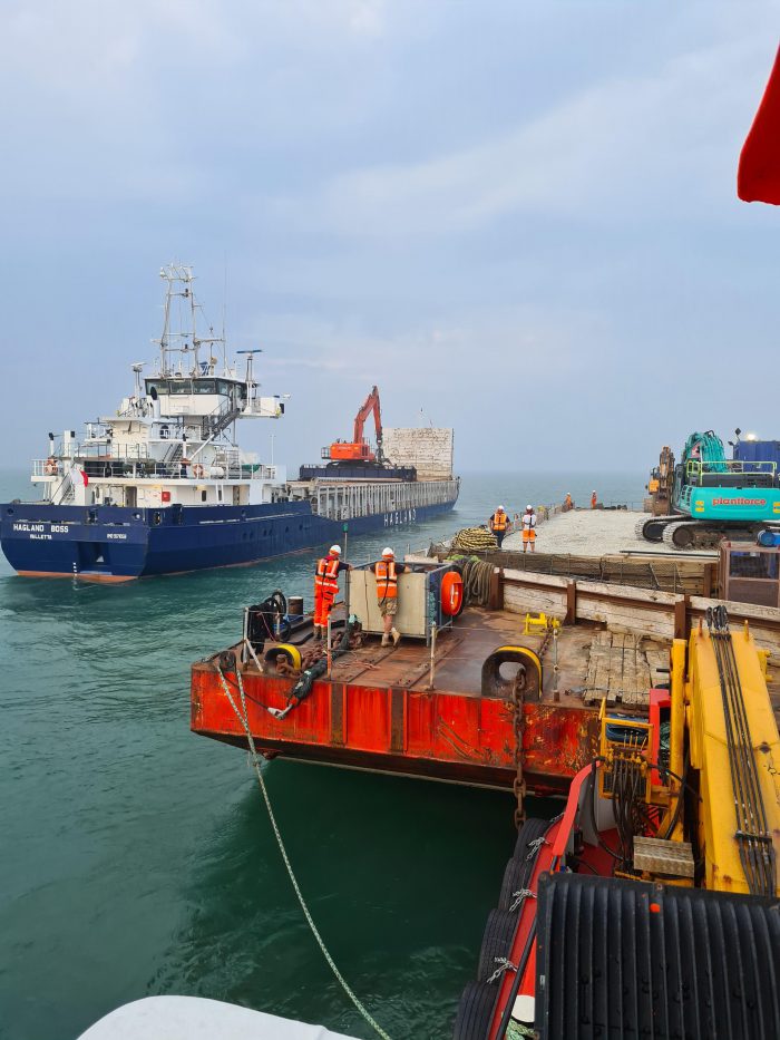 Transfer of rock to barge